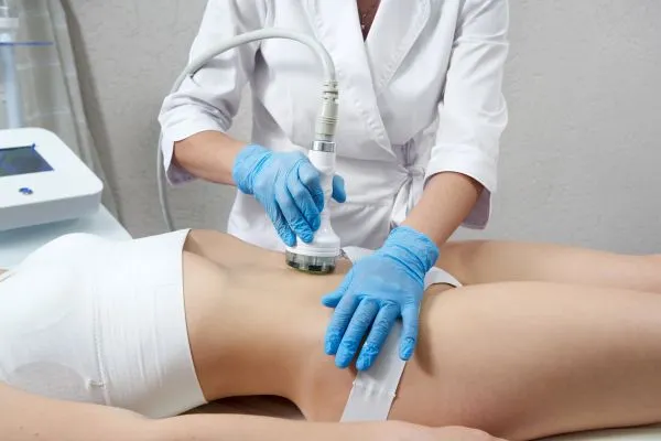 woman having HIFU treatment on her stomach to combat loose skin Cumbernauld  following weight loss